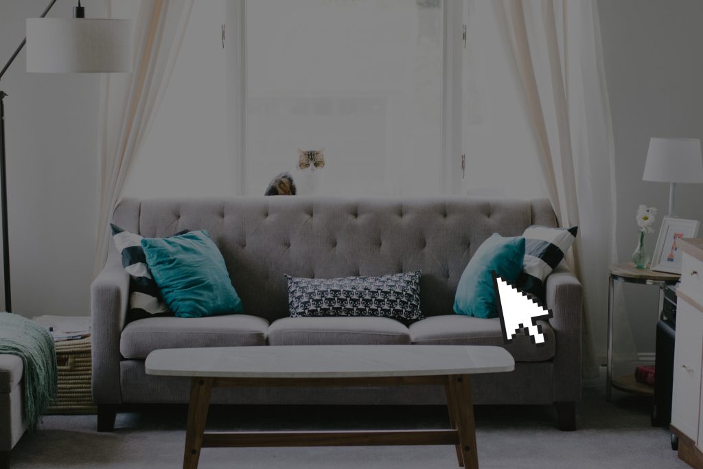 Modern couch with cursor icon overlay