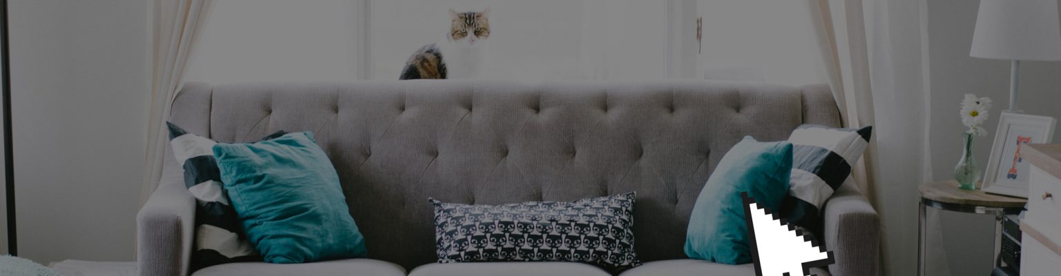 Modern couch with cursor icon overlay